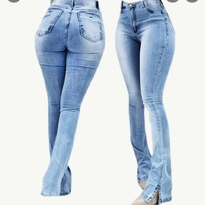 Jeans boot cut with a slit at the bottoms . Very stretchy and comfy